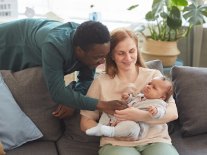 Fussy baby with 2 adults.