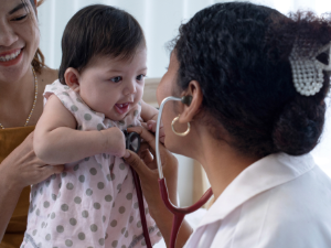 image of Parent, infant & doctor