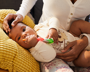 Baby with teether.