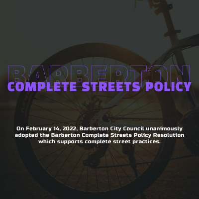 Image of bike tire announcing Barberton's Complete Street policy. Links to pdf of the policy.